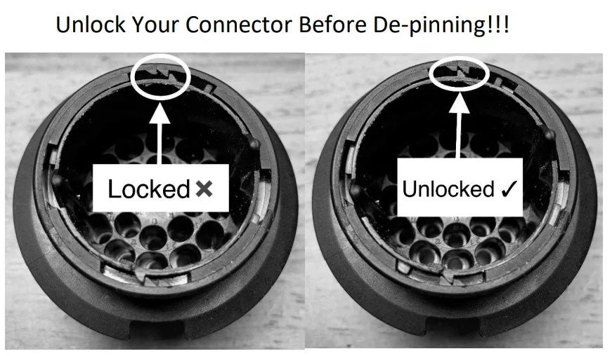 BMW circular 2.5 mm pin connector shown locked and unlocked before de-pinning